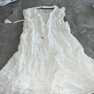 White sleeveless linen dress